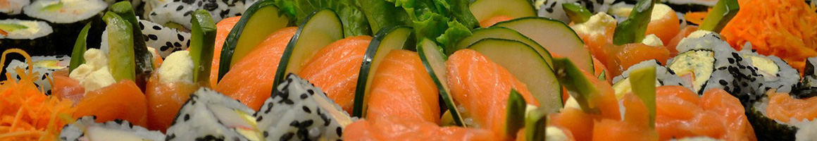 Eating Japanese Sushi at Fuji Sushi Bar Tulsa restaurant in Tulsa, OK.